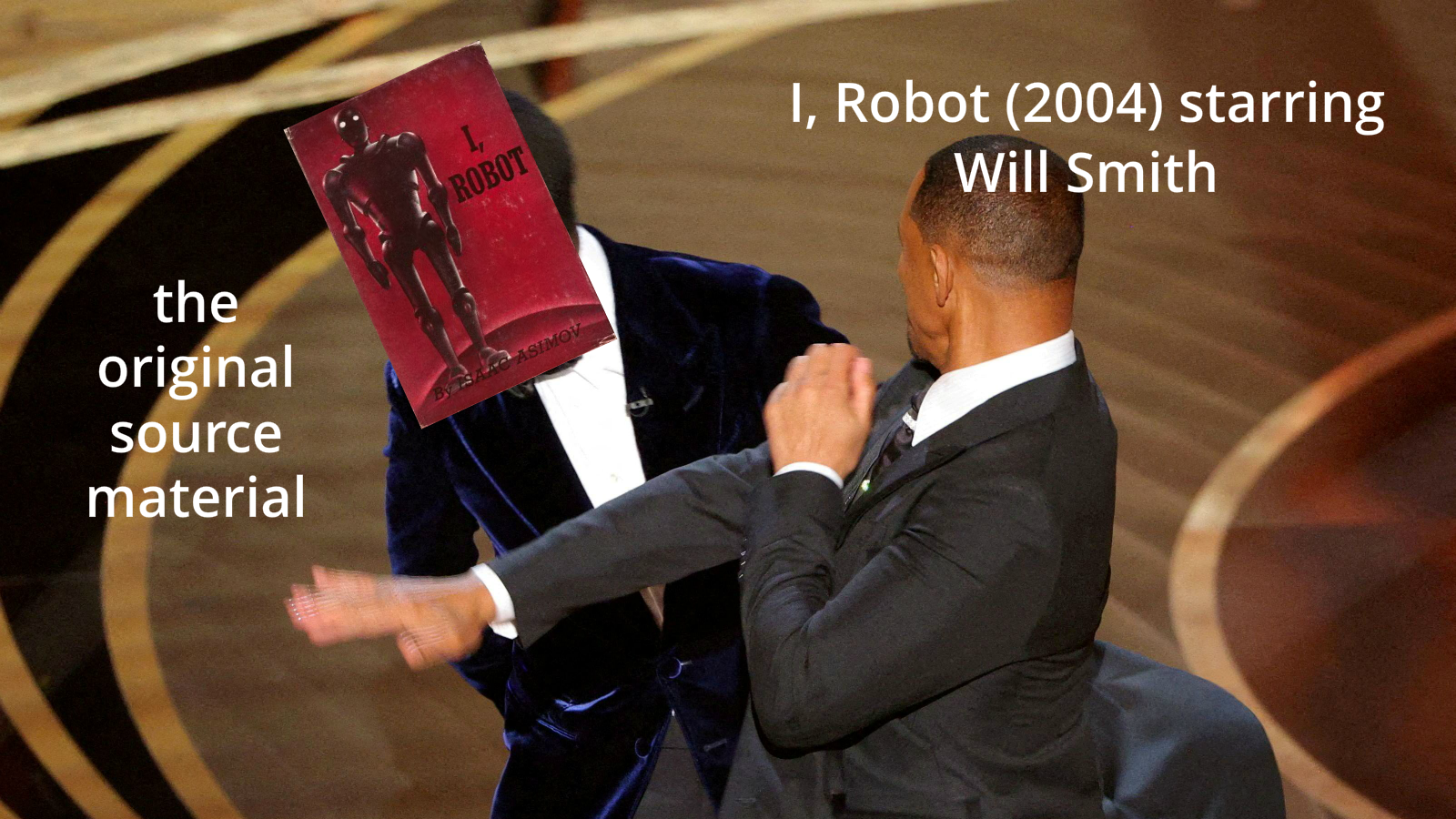 Photo of Will Smith slapping the original "I, Robot" story collection by Isaac Asimov